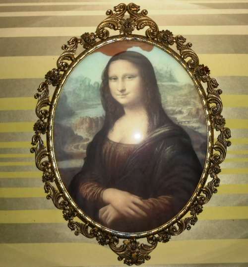 Mona Lisa behind an Italian Spelter Cast Frame with Bubble Glass