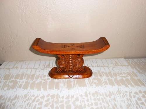 A CARVED WOODEN HEADREST OF SHONA ORIGIN