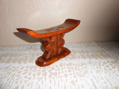 A CARVED WOODEN HEADREST OF SHONA ORIGIN