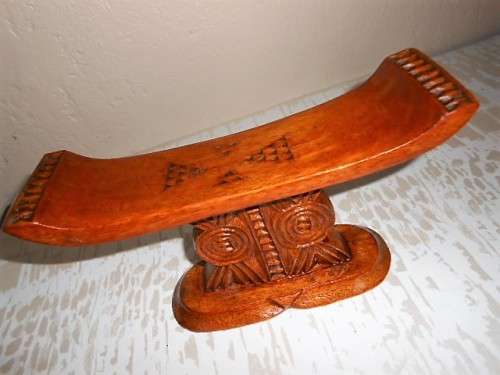 A CARVED WOODEN HEADREST OF SHONA ORIGIN