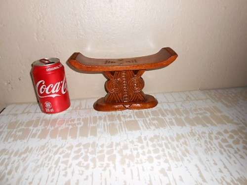 A CARVED WOODEN HEADREST OF SHONA ORIGIN