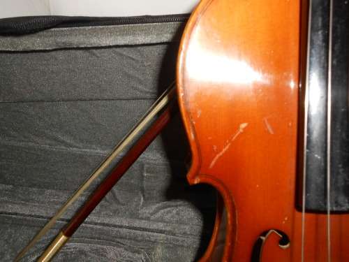 Violin with 2 bows, case and extras 60cm