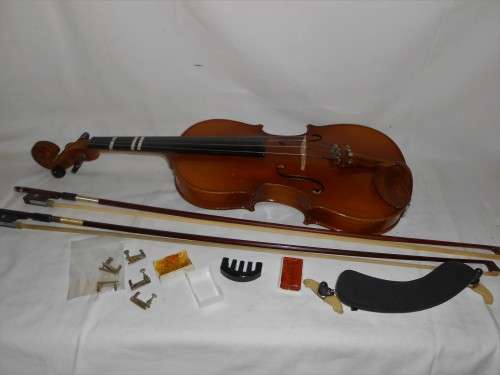 Violin with 2 bows, case and extras 60cm