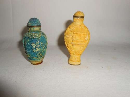Pair of Carved Chinese snuff bottles