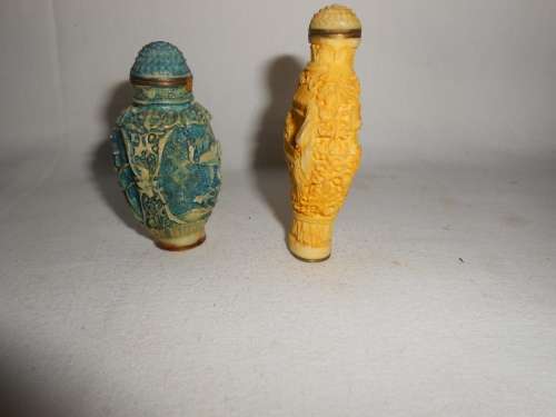Pair of Carved Chinese snuff bottles