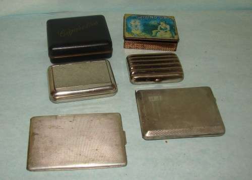 5 Vintage Cigarette Holders and  a Tabacco tin