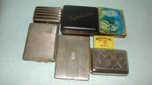 5 Vintage Cigarette Holders and  a Tabacco tin