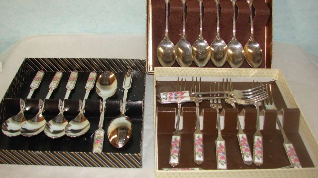 3 Box sets. Floral Ceramic Handled.  12 Tea Spoons and 9 Cake Forks