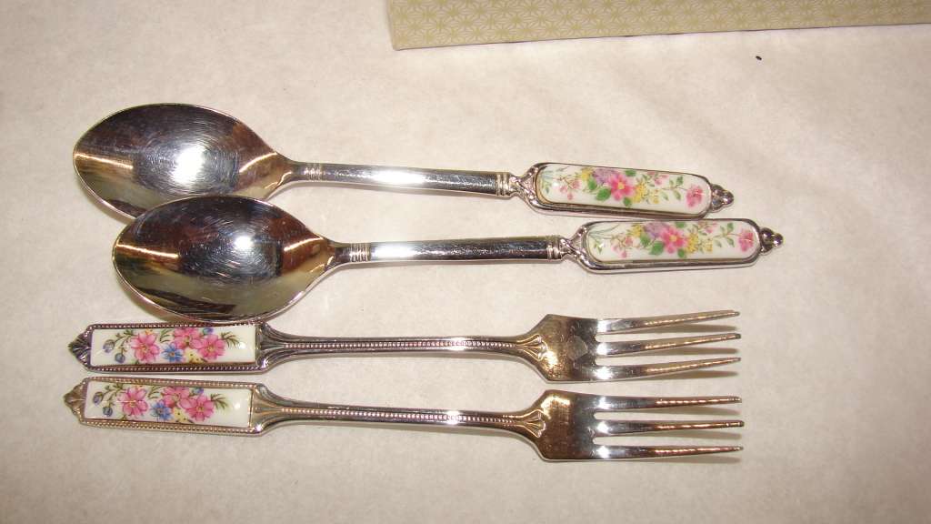 3 Box sets. Floral Ceramic Handled.  12 Tea Spoons and 9 Cake Forks
