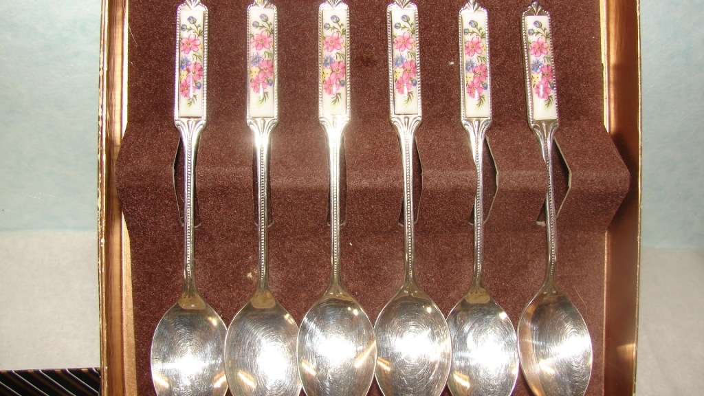 3 Box sets. Floral Ceramic Handled.  12 Tea Spoons and 9 Cake Forks