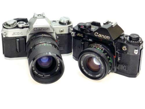 Canon A-1 and Canon AE-1 with Canon Lenses****Cosmetically Excellent****