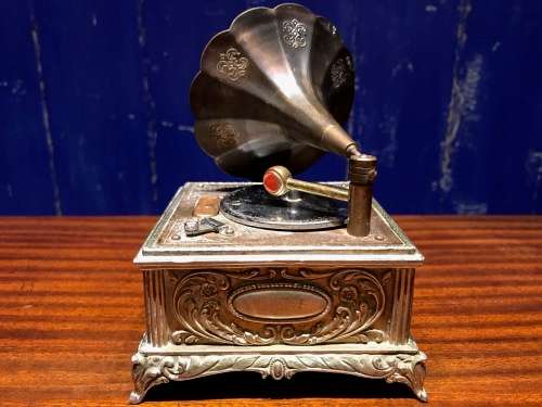 A VINTAGE JAPANESE GRAMAPHONE LIGHTER AND MUSICAL BOX