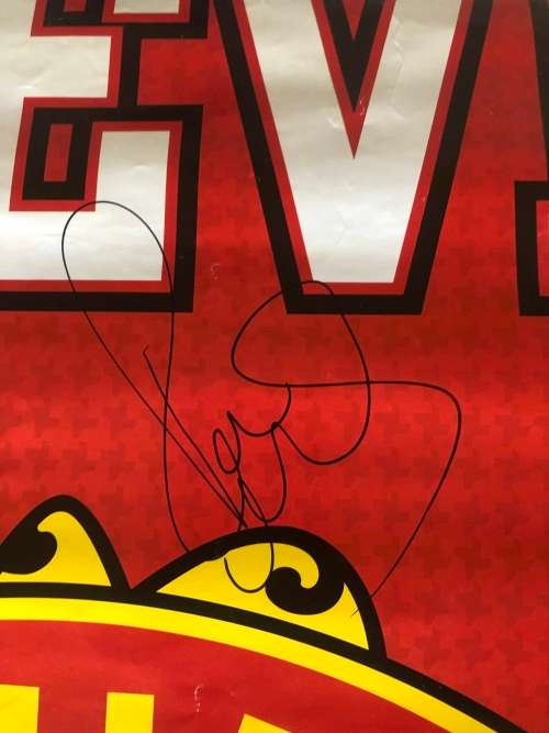 A MANCHESTER UNITED POSTER SIGNED BY THE TEAM