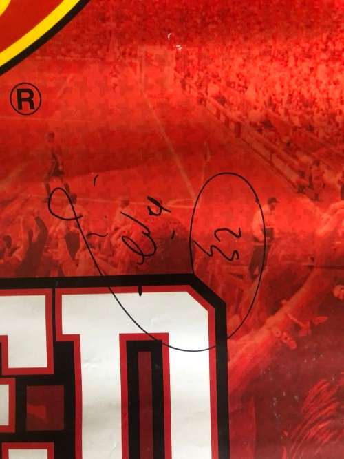 A MANCHESTER UNITED POSTER SIGNED BY THE TEAM