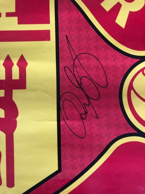 A MANCHESTER UNITED POSTER SIGNED BY THE TEAM