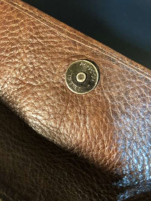 A PREOWNED LADIES MULBERRY CRAFTED LEATHER PURSE