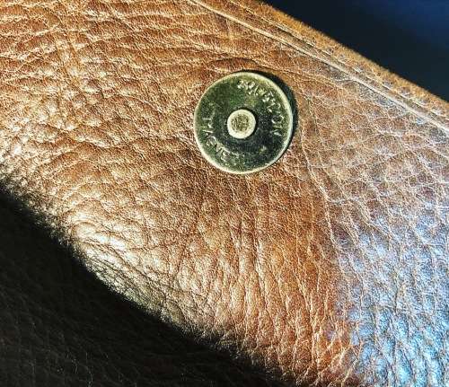 A PREOWNED LADIES MULBERRY CRAFTED LEATHER PURSE