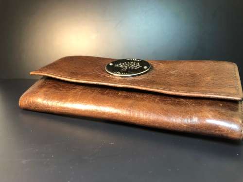 A PREOWNED LADIES MULBERRY CRAFTED LEATHER PURSE