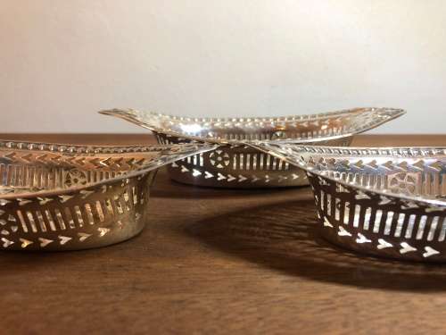 A TRIO OF  EDWARDIAN STERLING SILVER BONBON DISHES CIRCA 1906