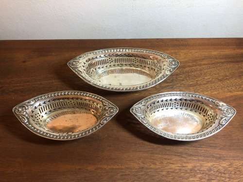 A TRIO OF  EDWARDIAN STERLING SILVER BONBON DISHES CIRCA 1906