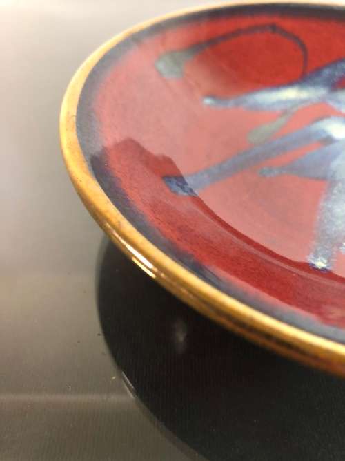 A PLATE BY AUSTRALIAN STUDIO POTTER JOHN EAGLE