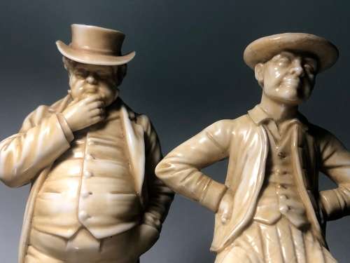 A PAIR OF ROYAL WORCESTER HADLEY COUNTRIES OF THE WORLD FIGURINES