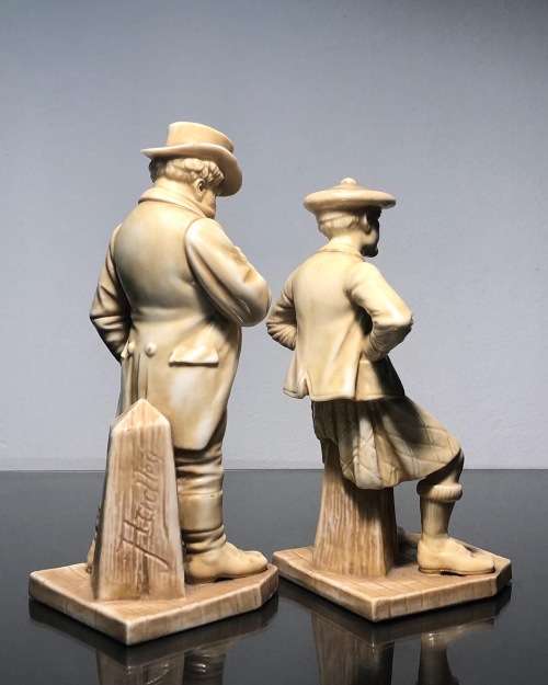 A PAIR OF ROYAL WORCESTER HADLEY COUNTRIES OF THE WORLD FIGURINES