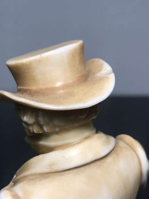 A PAIR OF ROYAL WORCESTER HADLEY COUNTRIES OF THE WORLD FIGURINES