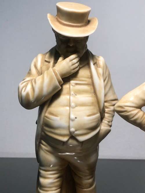 A PAIR OF ROYAL WORCESTER HADLEY COUNTRIES OF THE WORLD FIGURINES