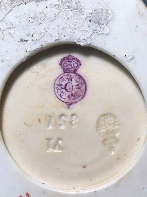 A PAIR OF ROYAL WORCESTER HADLEY COUNTRIES OF THE WORLD FIGURINES