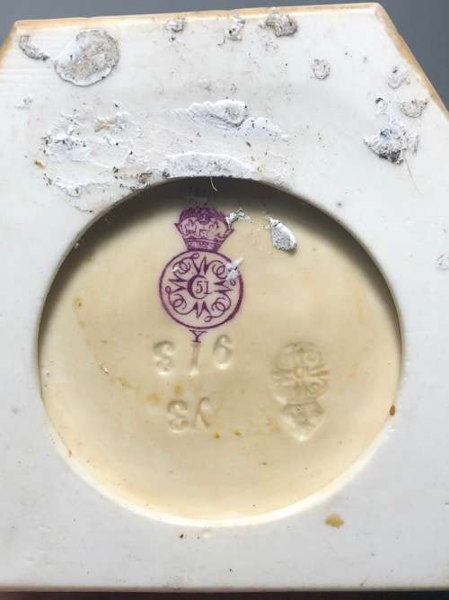 A PAIR OF ROYAL WORCESTER HADLEY COUNTRIES OF THE WORLD FIGURINES