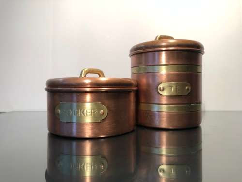 A SET VINTAGE DUTCH COPPER TEA AND SUGAR CANNISTERS