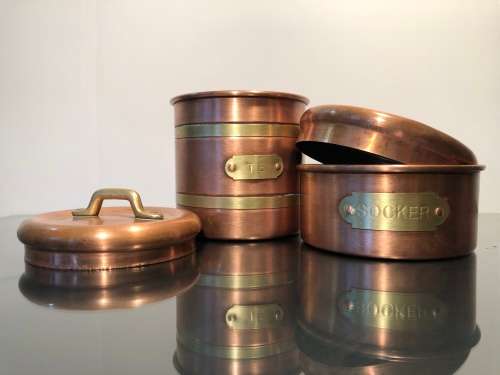 A SET VINTAGE DUTCH COPPER TEA AND SUGAR CANNISTERS