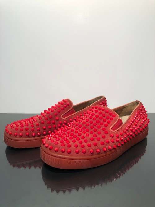 A Pair of Second Hand Christian Louboutin Red Spike Boat Shoes size 8.5