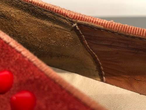 A Pair of Second Hand Christian Louboutin Red Spike Boat Shoes size 8.5