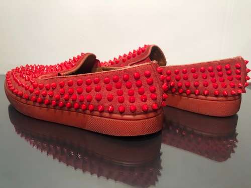 A Pair of Second Hand Christian Louboutin Red Spike Boat Shoes size 8.5