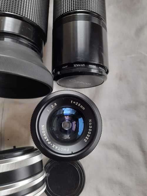 The last one Rare all Black Canon AE1 35mm SLR Film Camera Black camera with 6 lenses.