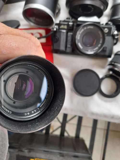 The last one Rare all Black Canon AE1 35mm SLR Film Camera Black camera with 6 lenses.