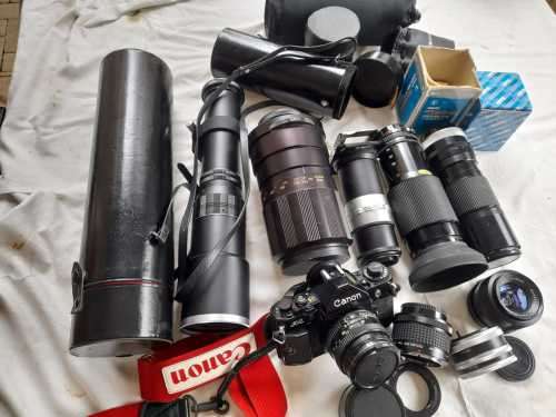 The last one Rare all Black Canon AE1 35mm SLR Film Camera Black camera with 6 lenses.