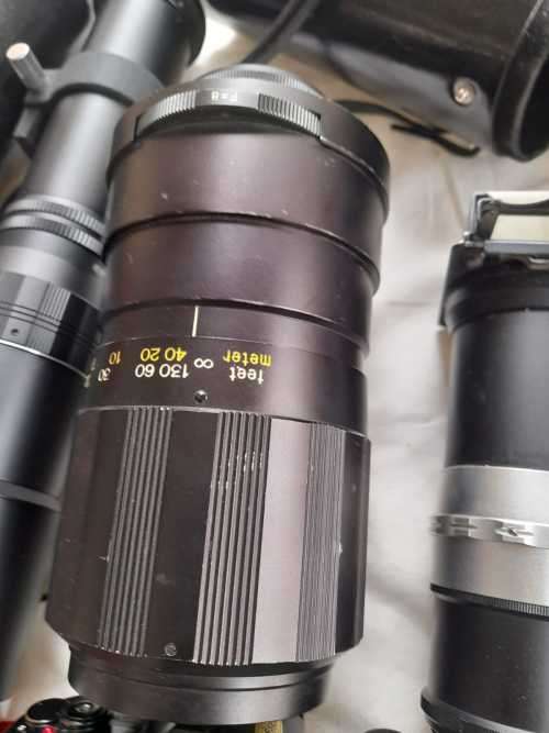 The last one Rare all Black Canon AE1 35mm SLR Film Camera Black camera with 6 lenses.