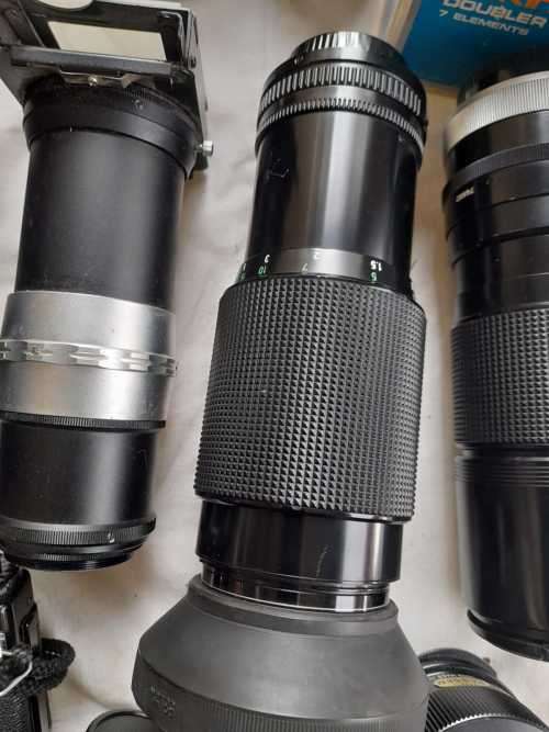 The last one Rare all Black Canon AE1 35mm SLR Film Camera Black camera with 6 lenses.