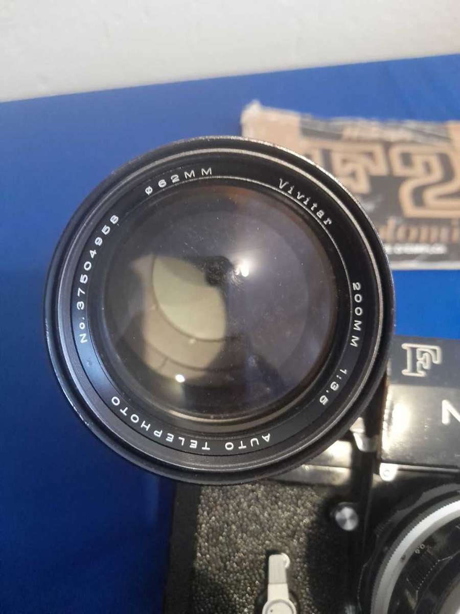 Nikon f black paint 35mm camera plus 4 lens