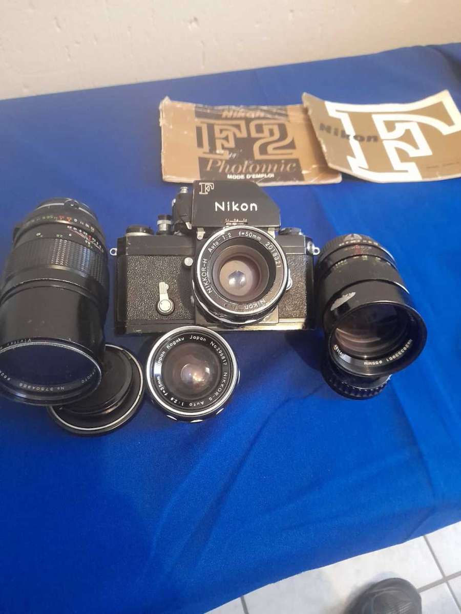 Nikon f black paint 35mm camera plus 4 lens