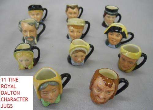 A set of eleven tiny Royal Doulton Charles Dickens CHARACTER JUGS, comprising Charles Dickens,