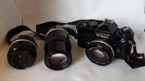 Nikon FE  Up for bids is an old work horse Nikon camera and tree lenses Shipping R45