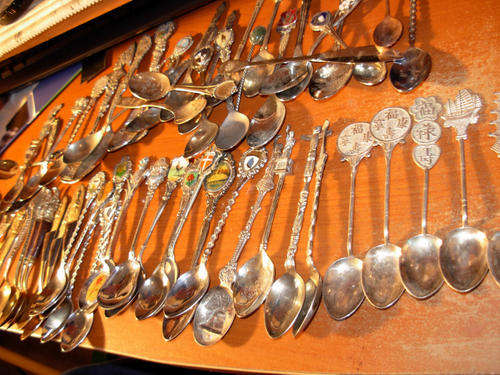 A collection of plus minus 100 collectible tea spoons