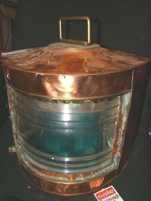 An electrified copper and brass corner SHIP'S LAMP, measuring 30cm high
