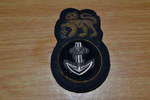 South African Navy Ratings cap badge.