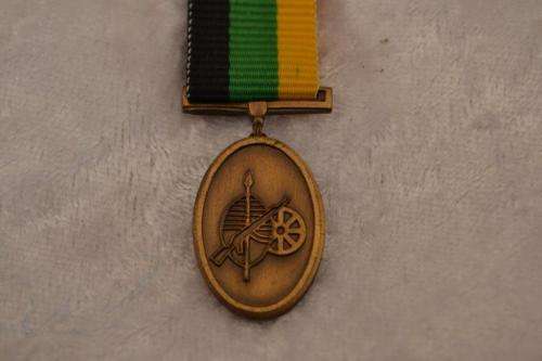 Miniature MK service medal in Bronze.