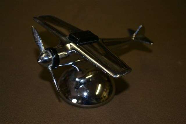 Chrome plane desk lighter made by A Hamilton Product. Made in USA.